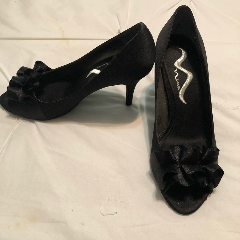 Ladies black peep toe holiday shoe